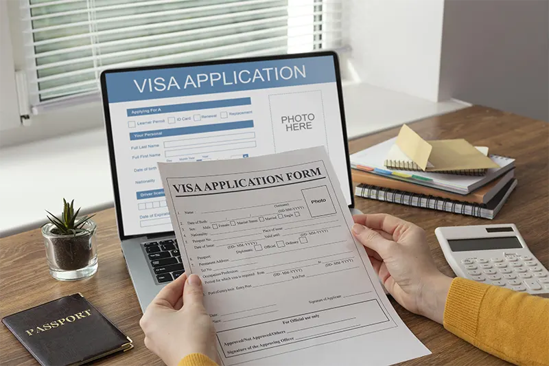 visa application form in laptop aives australia