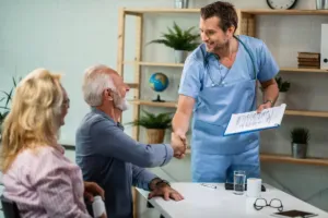 A aged man getting care from Doctor
